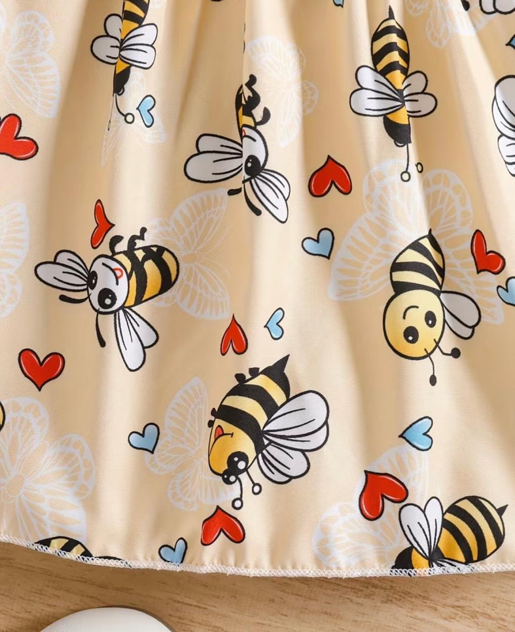 Flared bee print frock with gathered skirt hem and colorful heart details