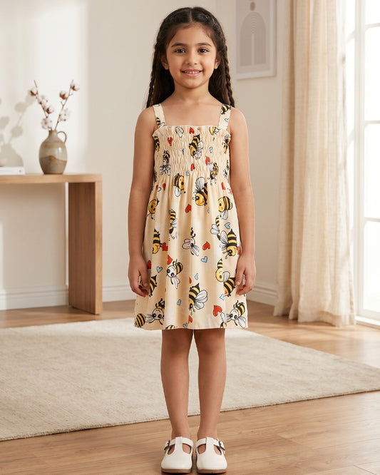 Girls' sleeveless frock with honey-yellow base and colorful bee print, gathered skirt