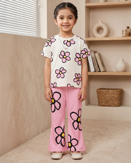 Floral round-neck top and elastic-waist flared trousers in pink with flower print
