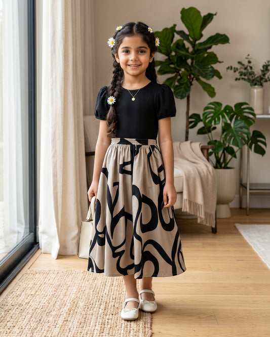 Sweet Whirl dress with black short sleeves and swirly black-and-cream skirt