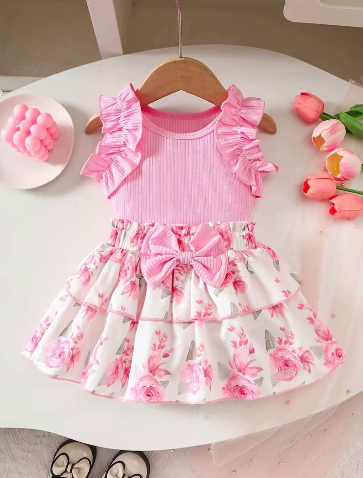 Girls' pink sleeveless dress set with ruffled bodice and gathered floral skirt