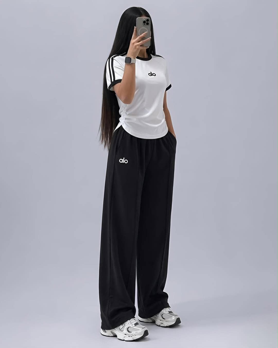 Black wide-leg pants and white sleeveless top co-ord set with triple stripe detail