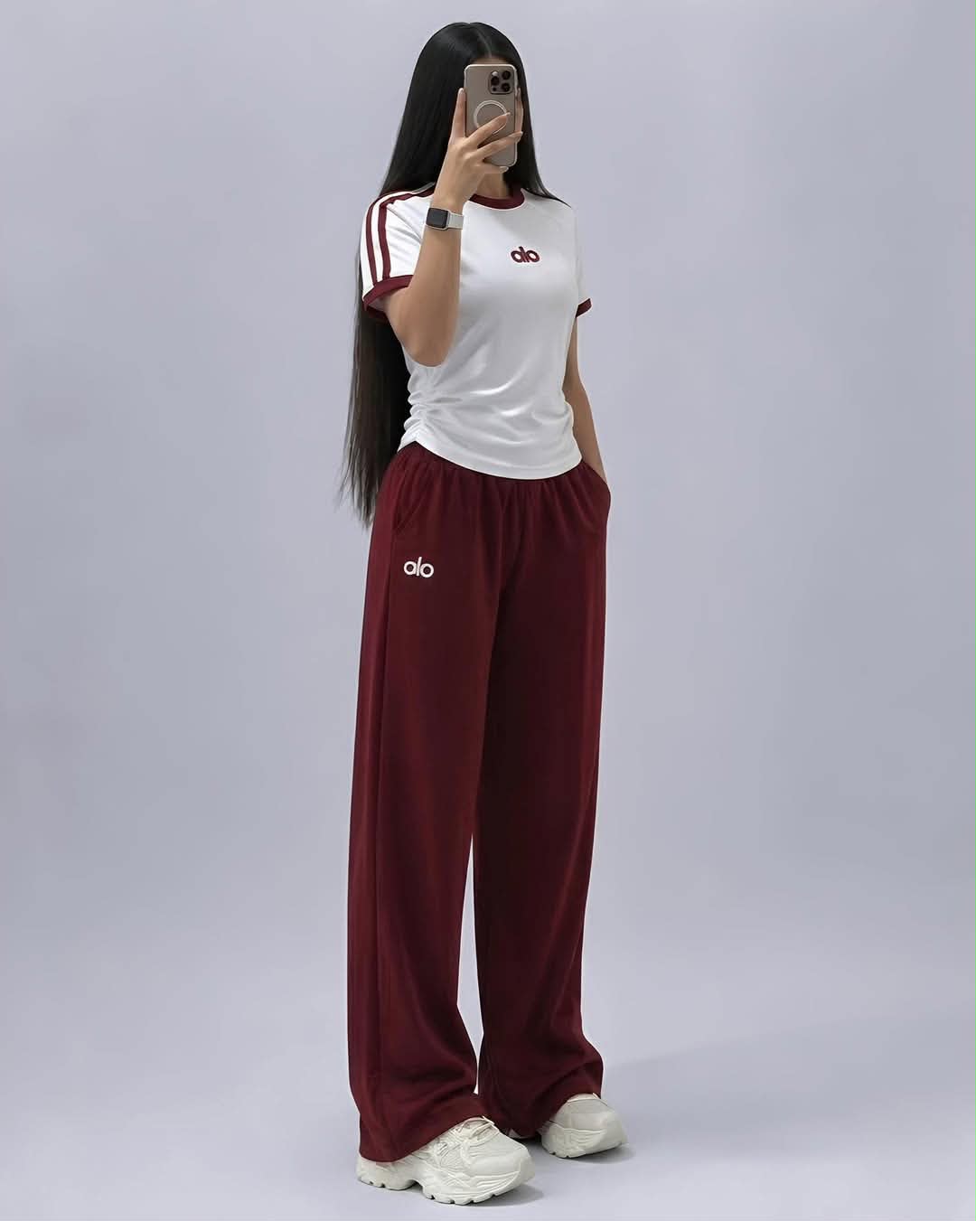 Maroon wide-leg pants and white sleeveless top co-ord set with triple stripe detail