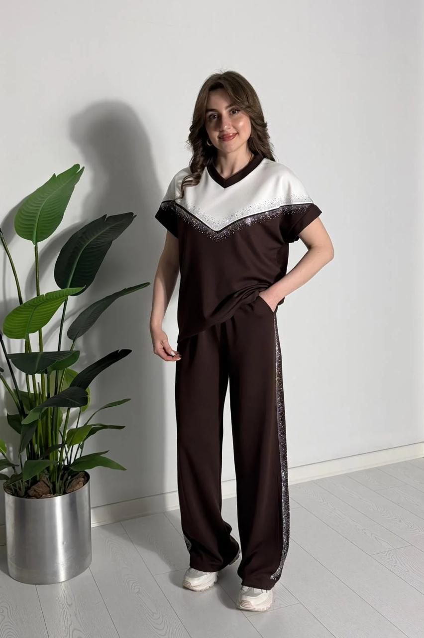 Brown two-piece co-ord set with white yoke V-neck top and matching wide-leg pants
