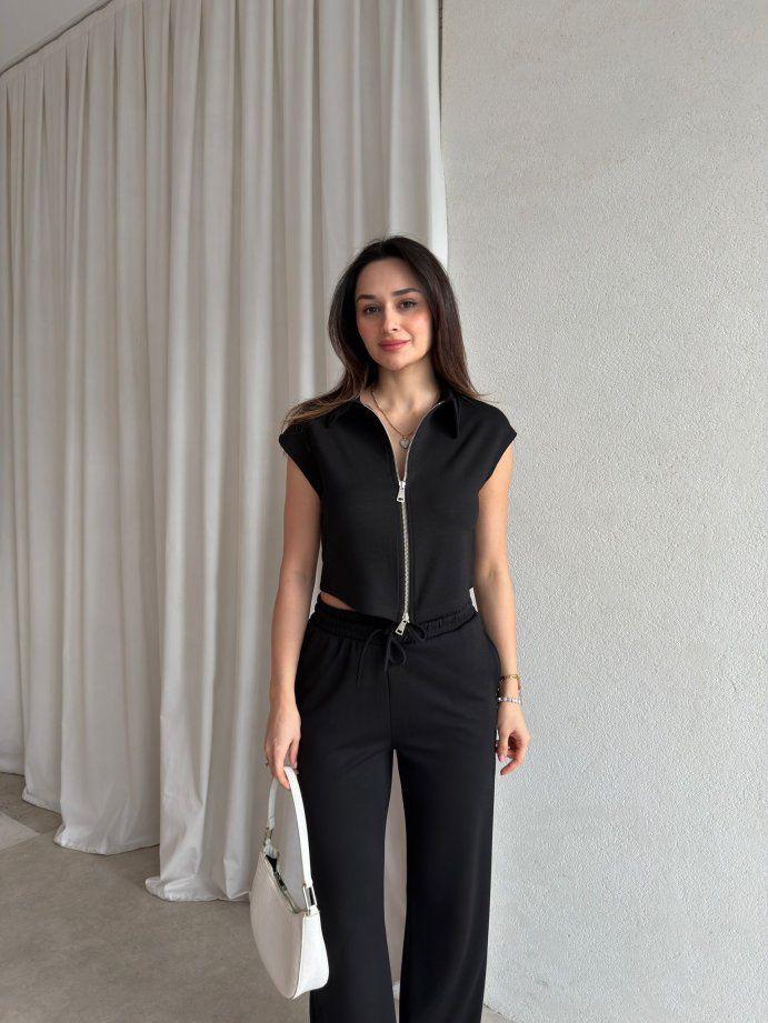 Black zip-front sleeveless top and wide-leg pants co-ord set with drawstring waist