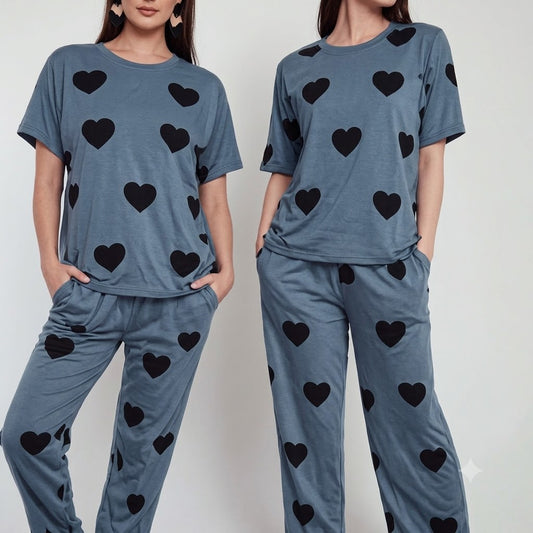 Heart print lounge set: blue short-sleeve T-shirt and matching long pants with black hearts