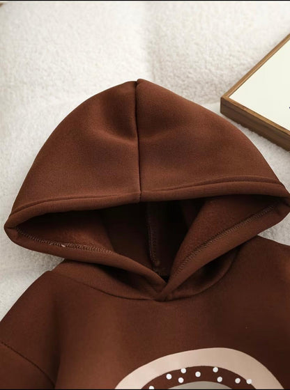 Brown pullover hoodie with pointed hood and kangaroo pocket seam detail