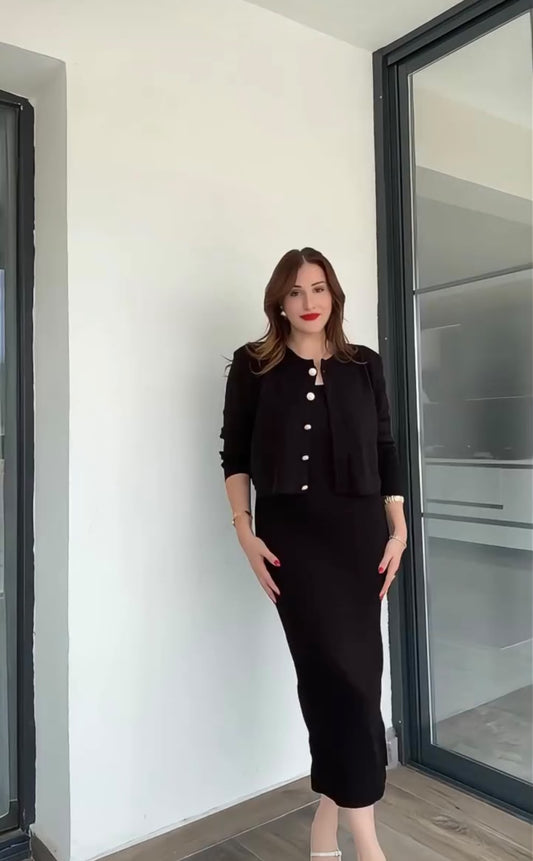 Black knit winter set with button-front cardigan and matching pencil skirt
