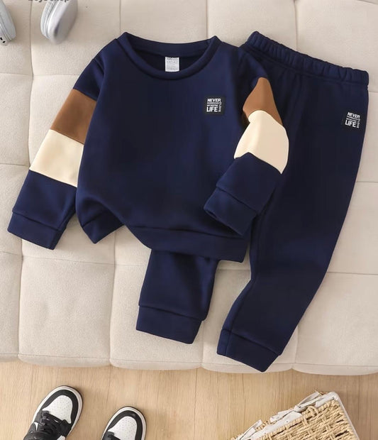 Kids navy sweatshirt and jogger set with tan and white color-block sleeves
