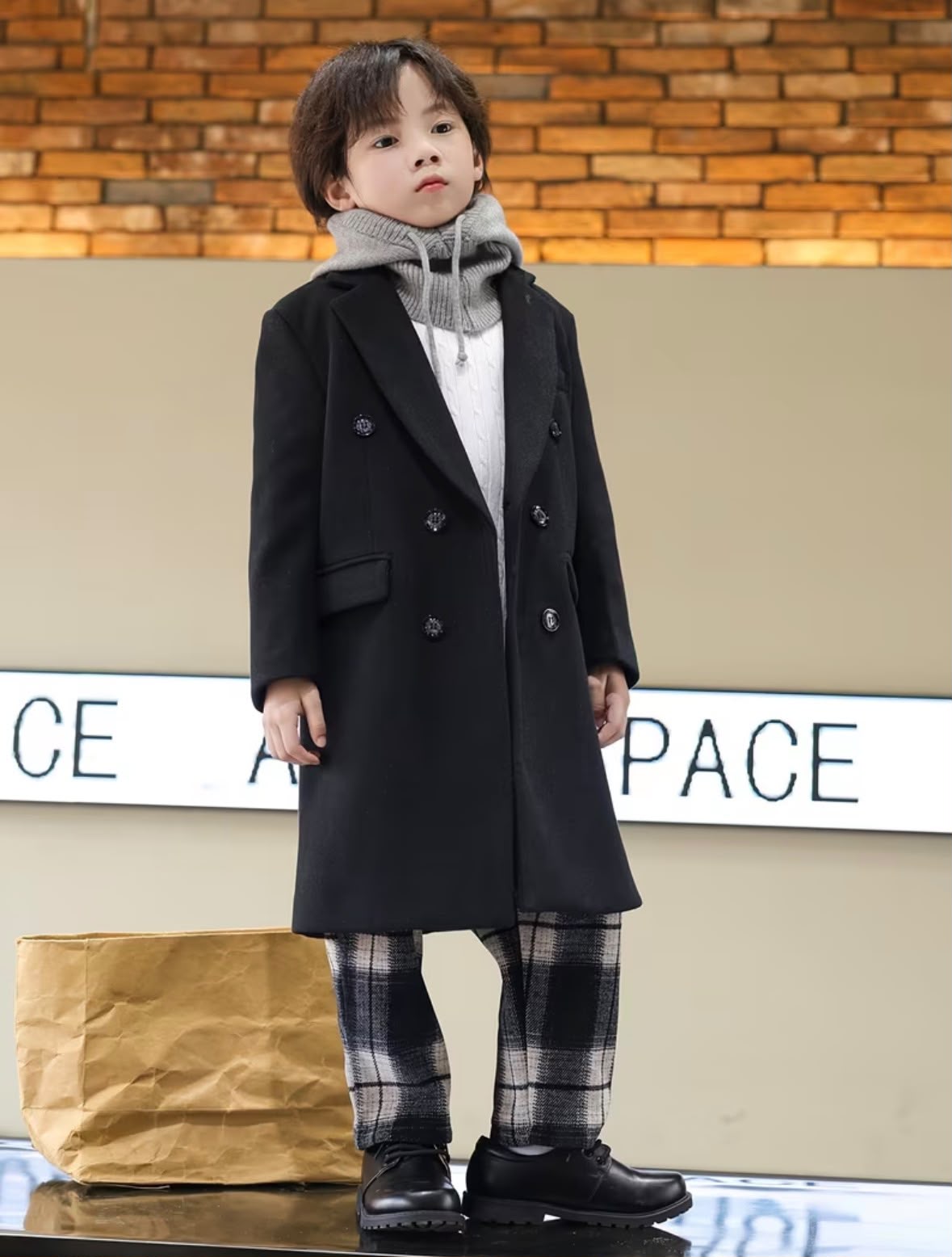 Vintage black trench coat with flap pockets and double-breasted closure, front view