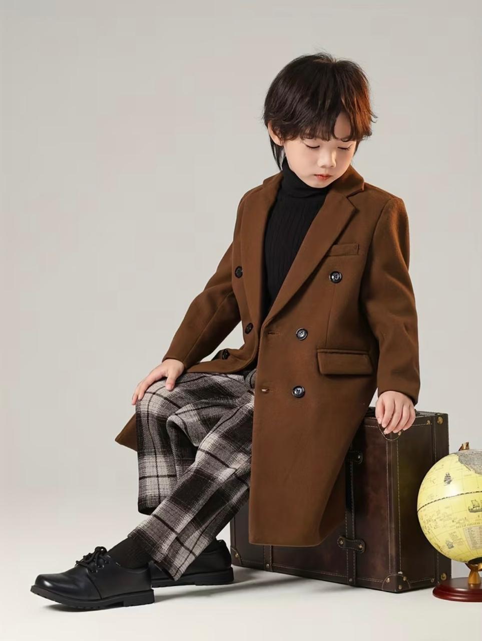 Brown trench coat with double-breasted buttons and flap pocket at chest level