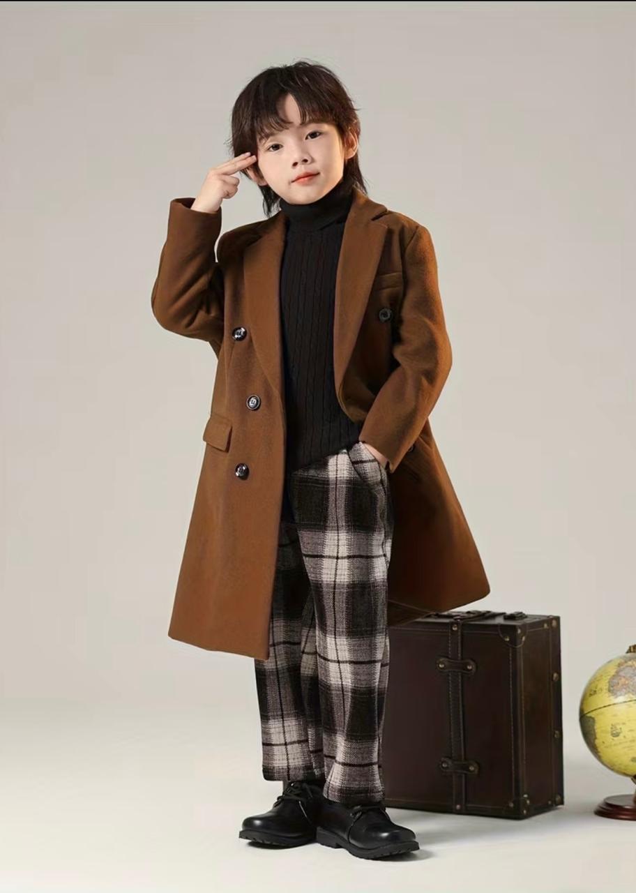Brown double-breasted trench coat with chest pocket and long straight silhouette