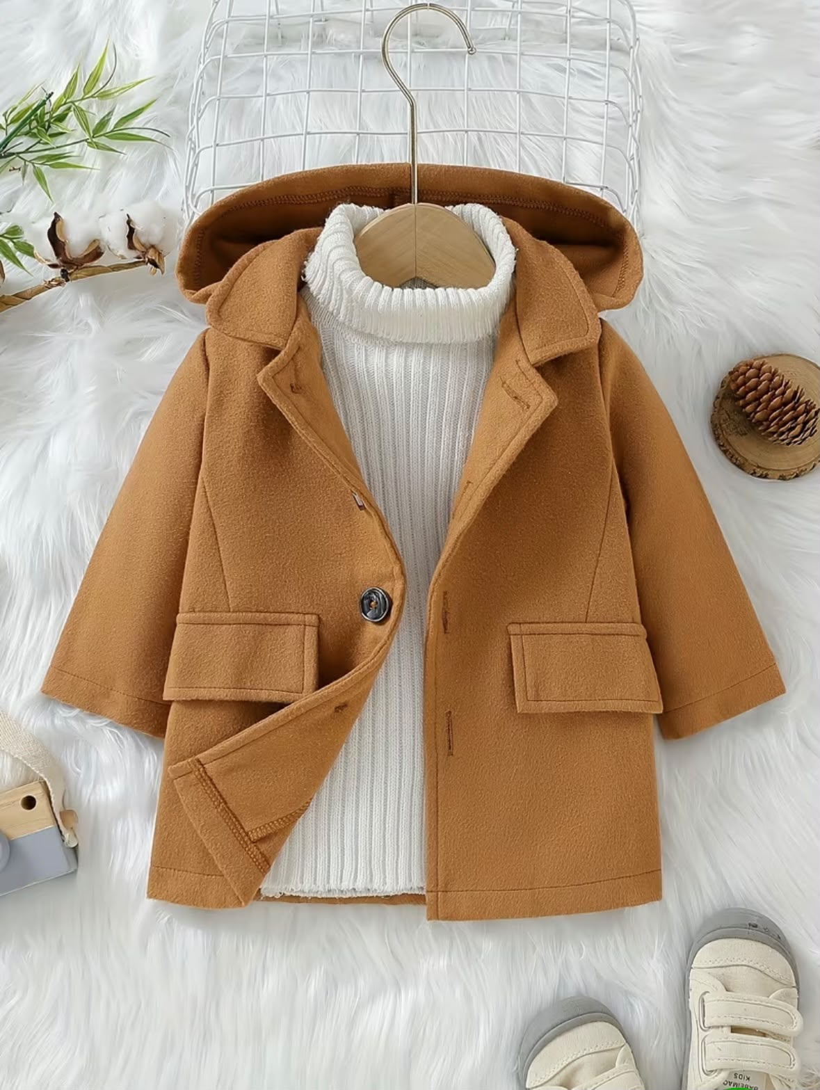Camel hooded coat with button front, flap pockets, and folded hood