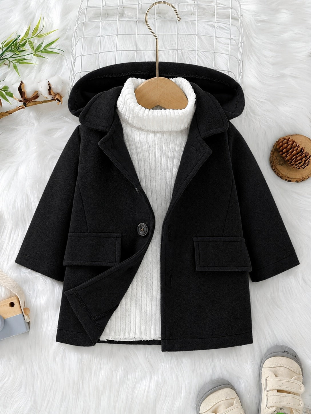 Black hooded coat with button front and two flap pockets