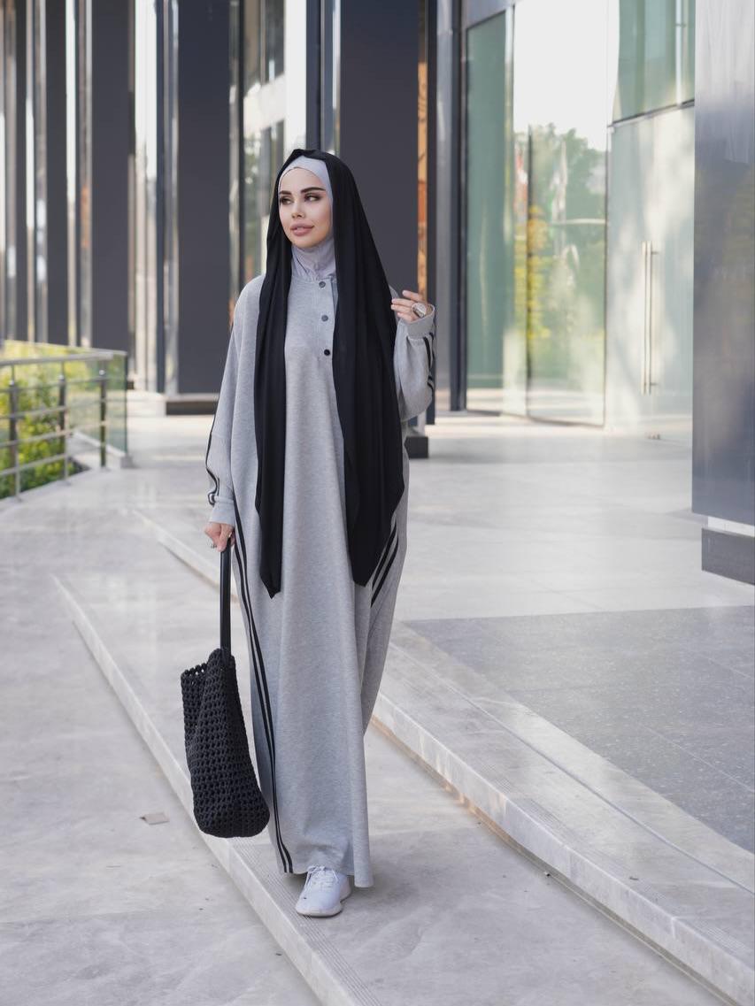 Grey abaya dress with black hijab and open-front drape, long sleeves and button details