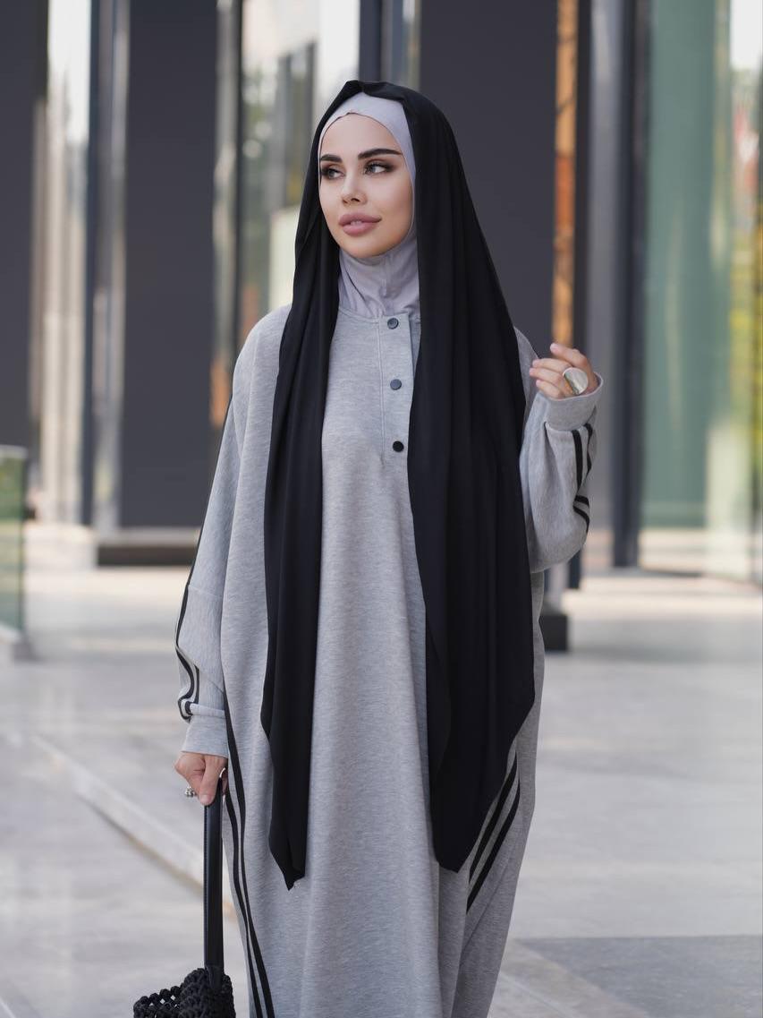 Grey long abaya dress with button front and black hijab, loose fit