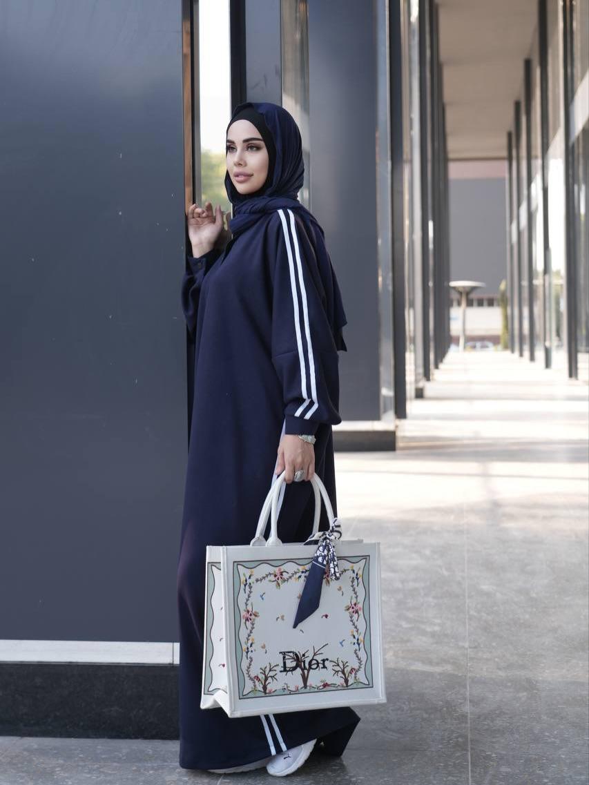 Dark navy long abaya with white sleeve stripes and black hijab, button-front design