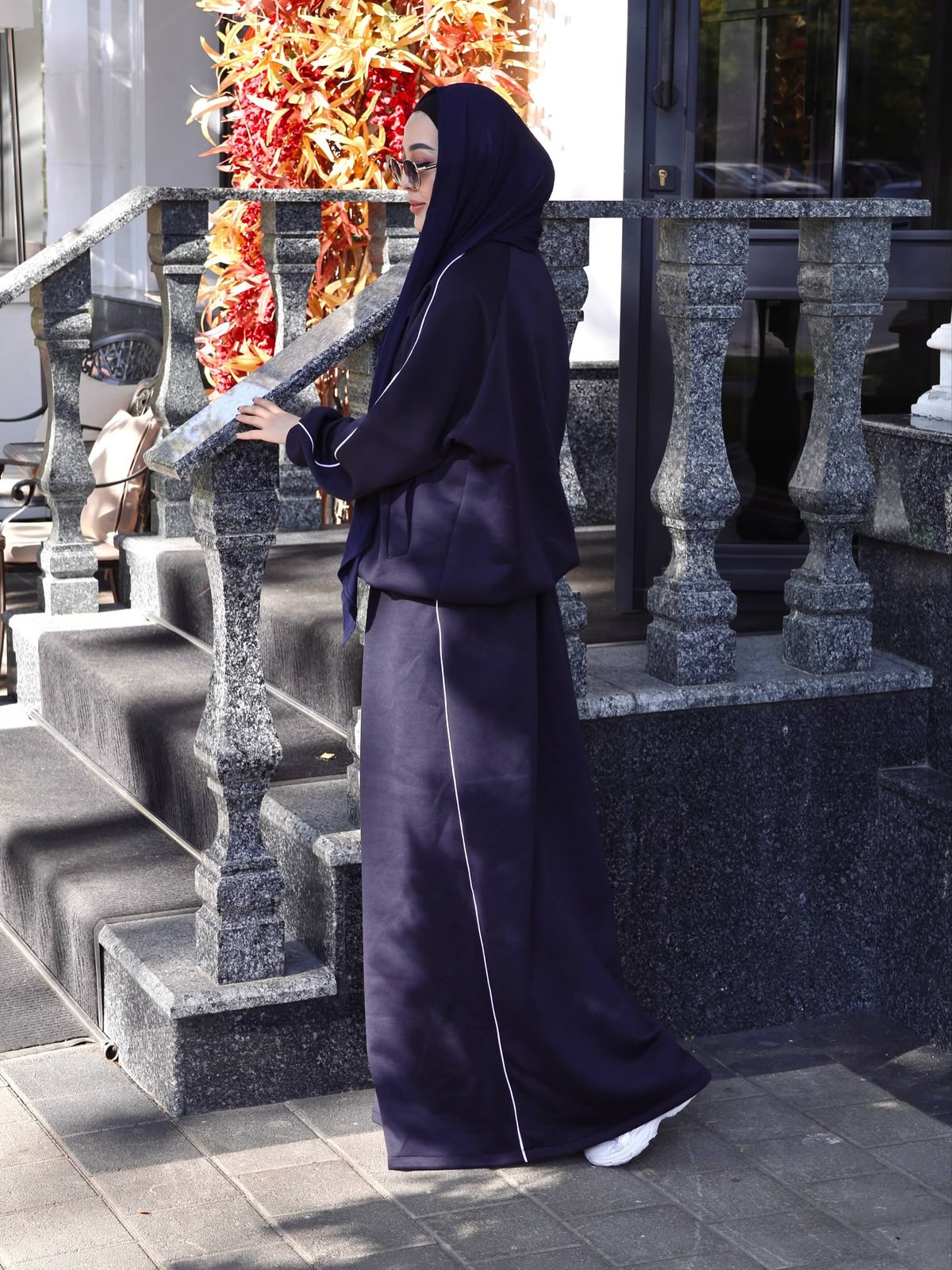 Chic Line maxi dress, navy hooded long sleeves, full-length skirt, side view