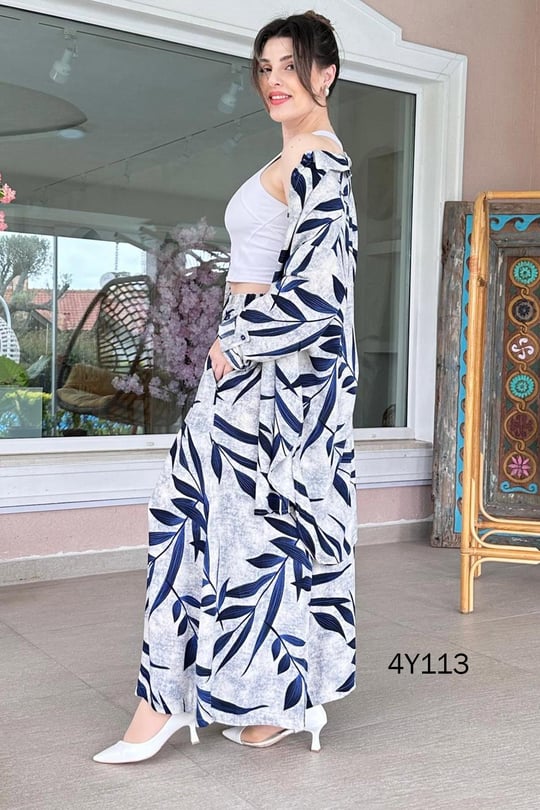 Leaf-print co-ord set with long skirt and buttoned top, full length in navy leaf print