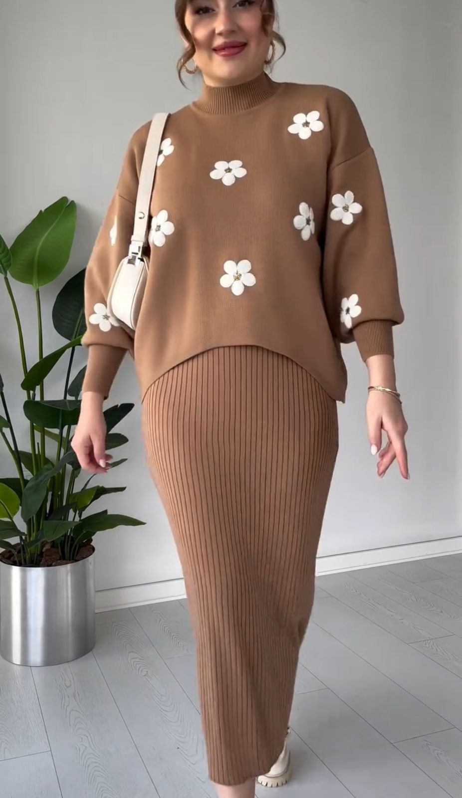 Brown ribbed bodycon midi dress with long sleeves and white flower appliques