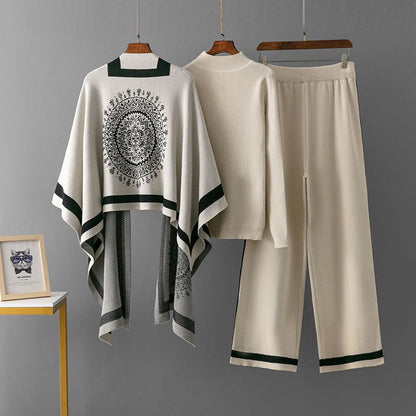 Cami three-piece set: white poncho top, cami, and wide-leg pants with dark green trim