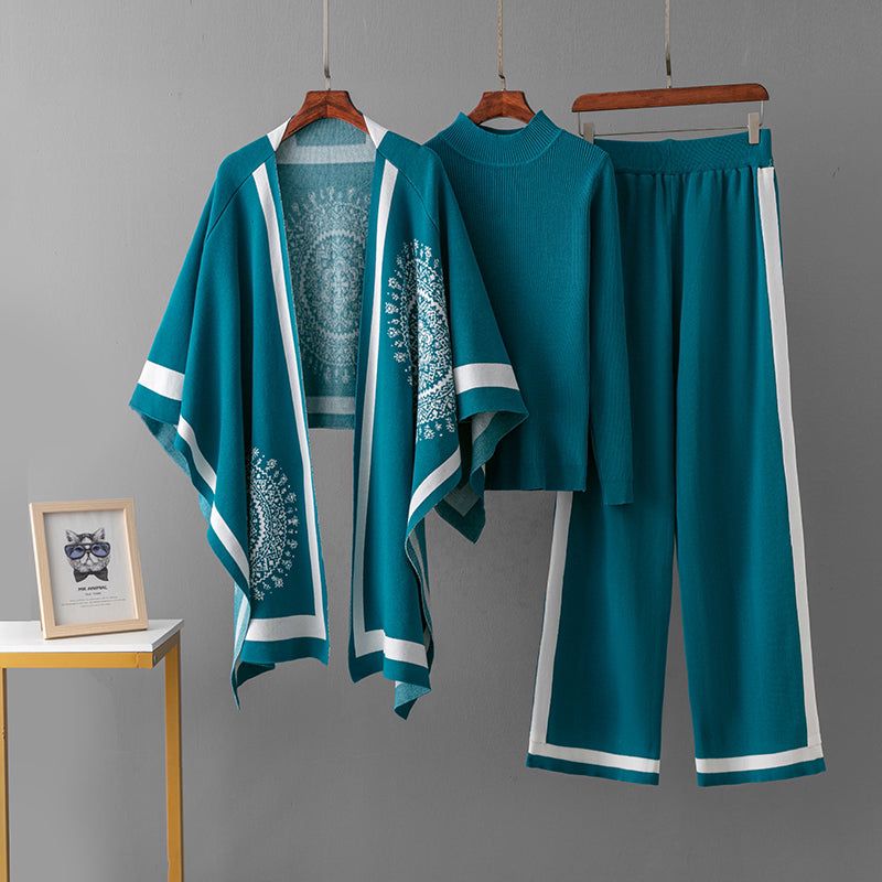 Cami three-piece set: teal poncho top, cami, and wide-leg pants with light teal trim