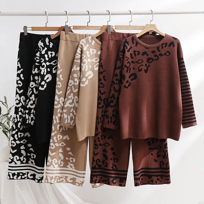 Leopard print woolen sets on hangers: black, camel, and brown tops and pants