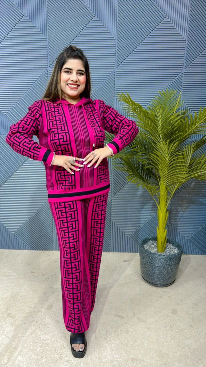 Pink geometric patterned hoodie and matching wide-leg pants set