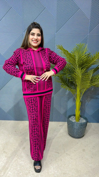 Pink geometric patterned hoodie and matching wide-leg pants set