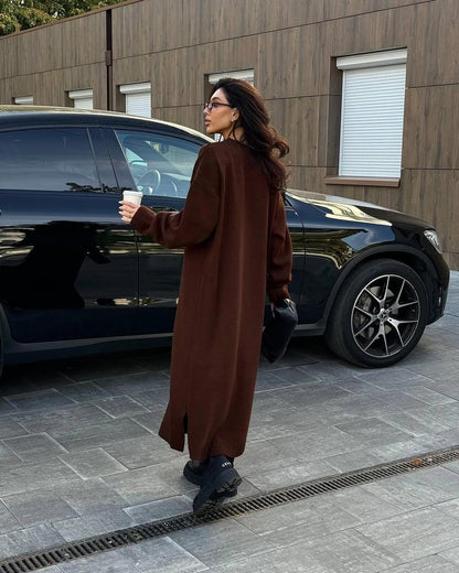 Dark maroon balloon-sleeve maxi dress with long sleeves and relaxed fit
