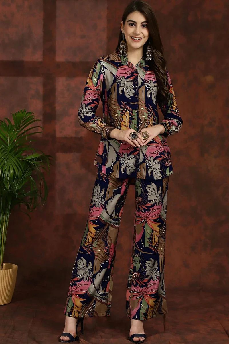 Floral shirt-collar tunic and matching trousers, long sleeves, navy base with pink and white