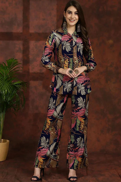 Floral shirt-collar tunic and matching trousers, long sleeves, navy base with pink and white