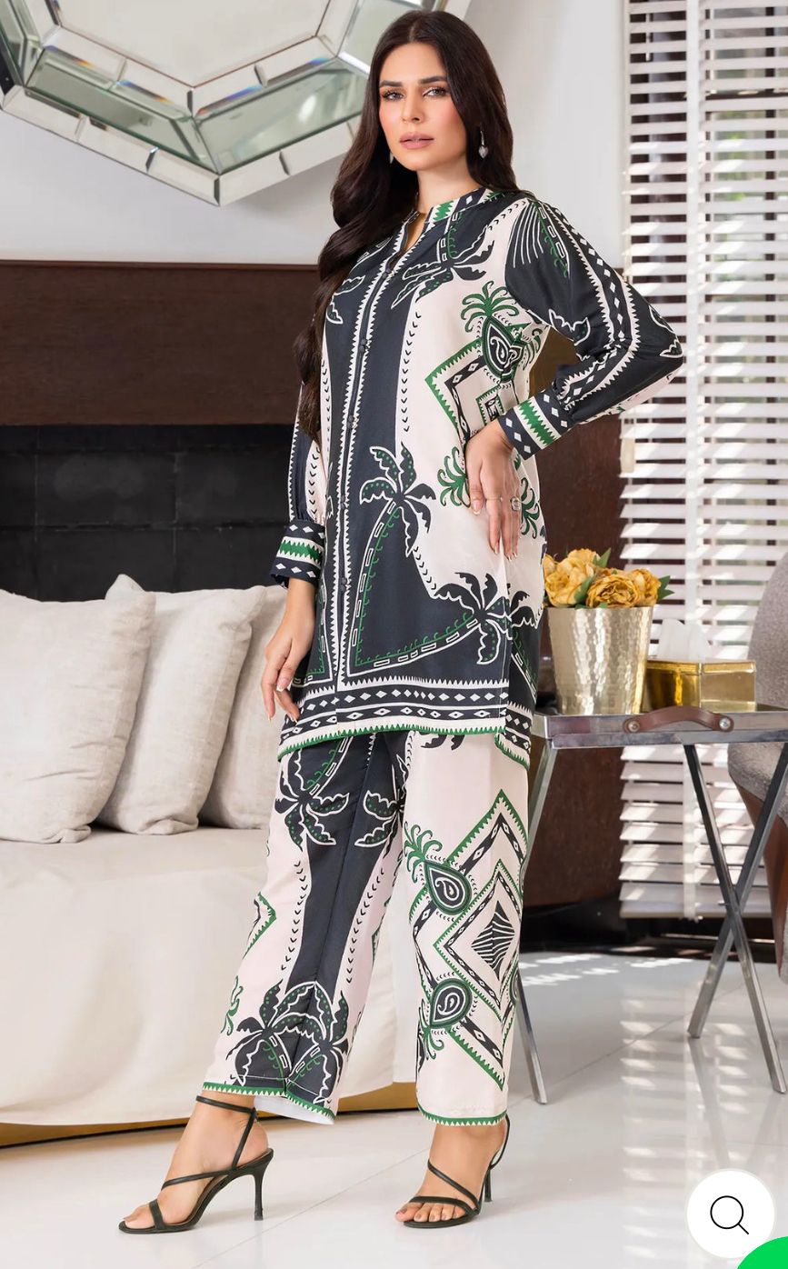Ebony Chic cord set, black jacket and wide-leg pants with green-and-white motifs