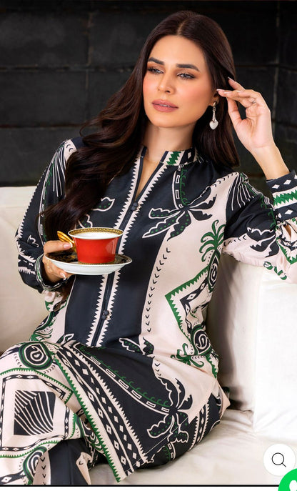 Matching cord set in black with green and white patterned jacket and pants
