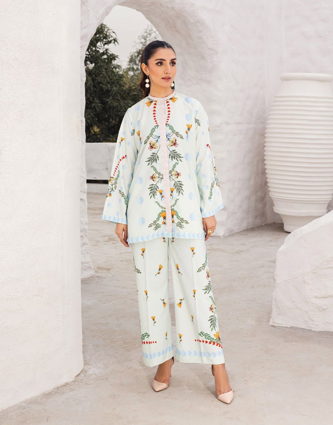 Light blue printed kurta set with wide-leg pants and round neckline floral embroidery