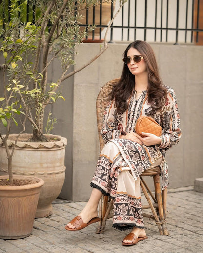 Printed kurta and pants set in cream with multicolor floral motifs and trim