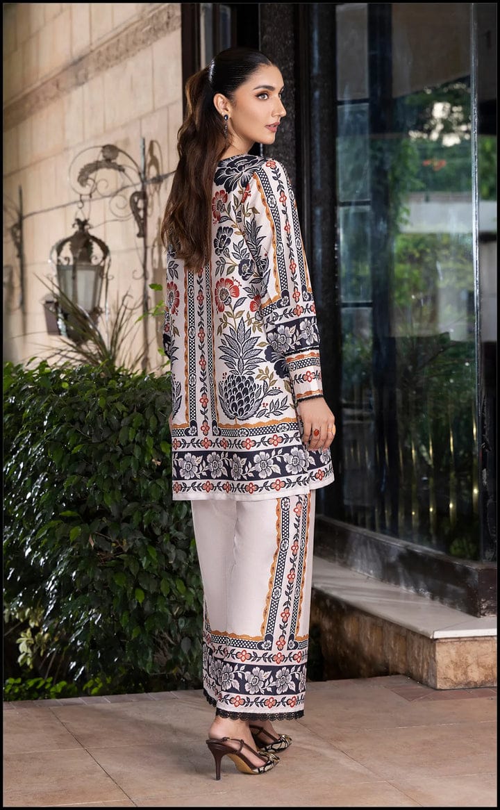 Printed kurta and straight pants set in cream with multicolor border and cuffs