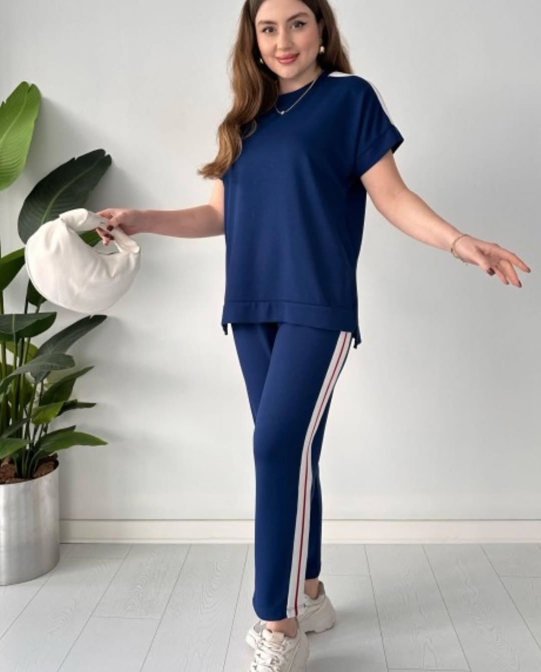2-piece Turkish panel co-ord set in navy: short-sleeve top and slim pants with side stripe.