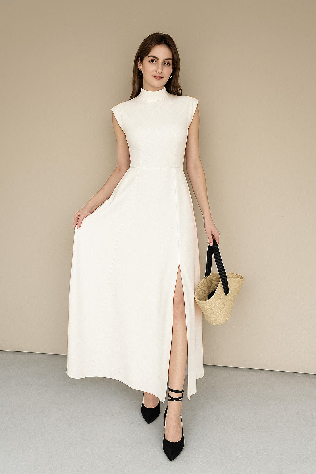 Cream sleeveless long top, high neck, A-line cut with side slit hem