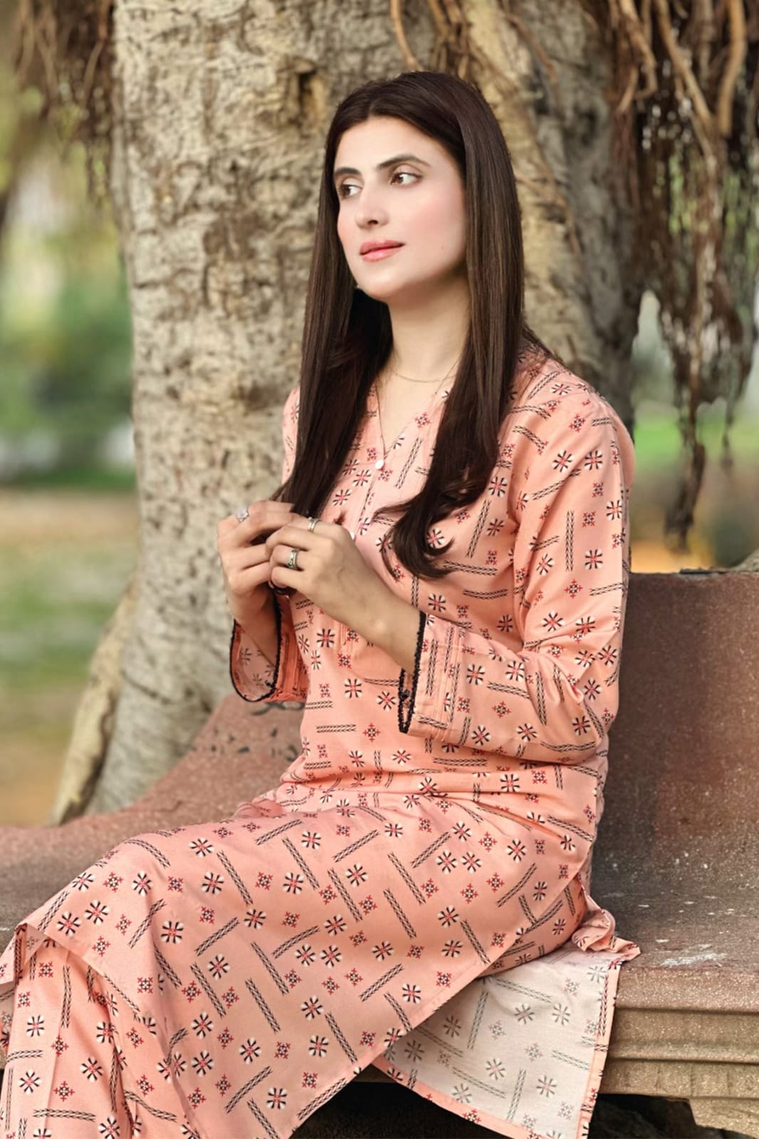 Blush pink 2-piece printed kurta and pants set, close-up of round neckline and sleeves
