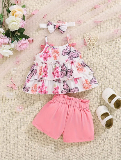 Floral butterfly print ruffle-hem top with pink shorts set, bow straps and tiered skirt