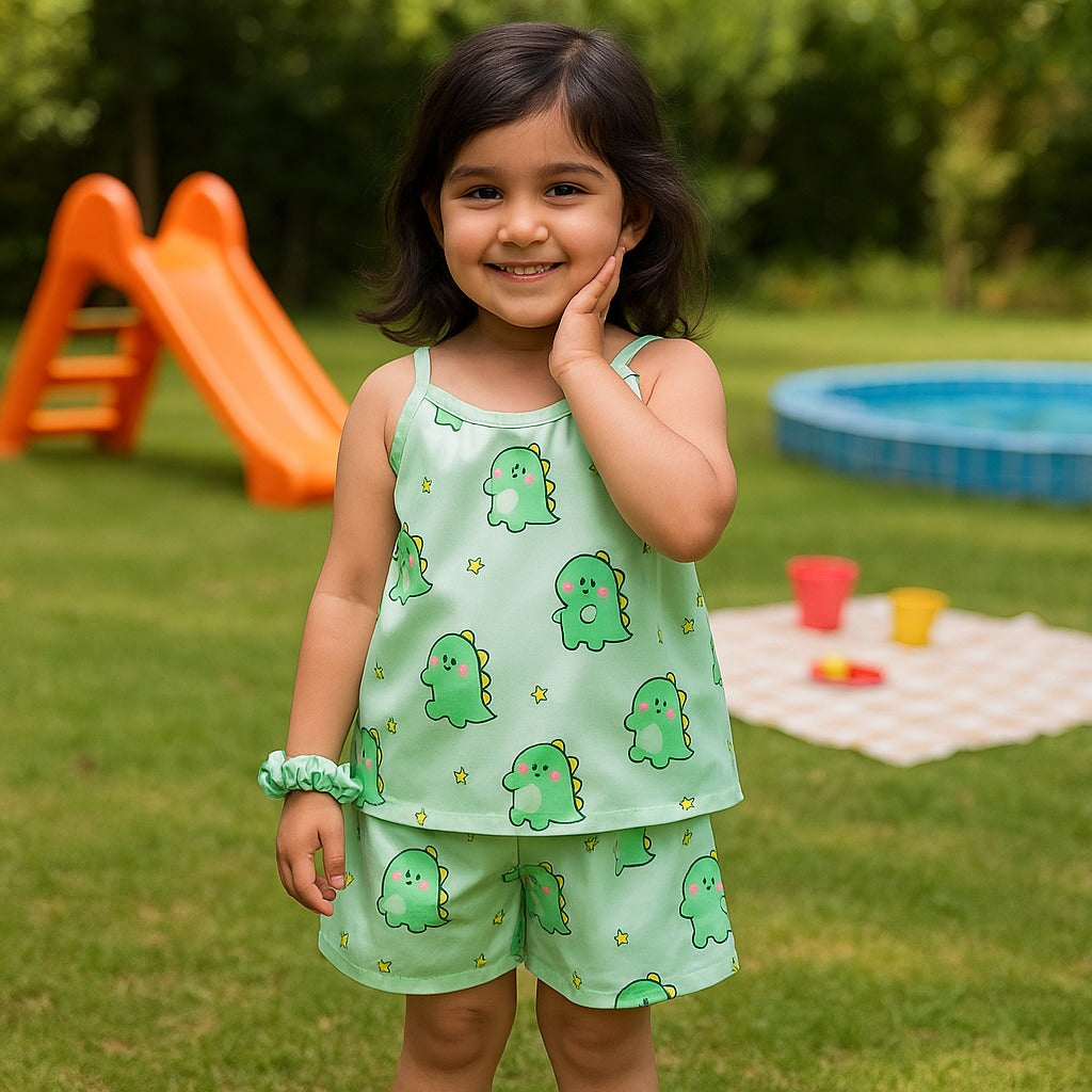 Mint green kids short set with cartoon dinosaur print cami and ruffle hem shorts