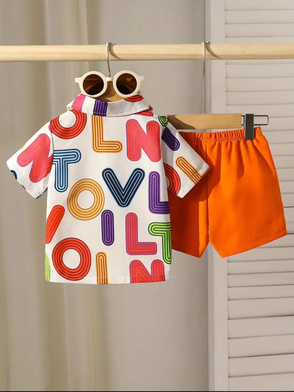 Kids letter-print polo shirt and orange elastic-waist shorts set