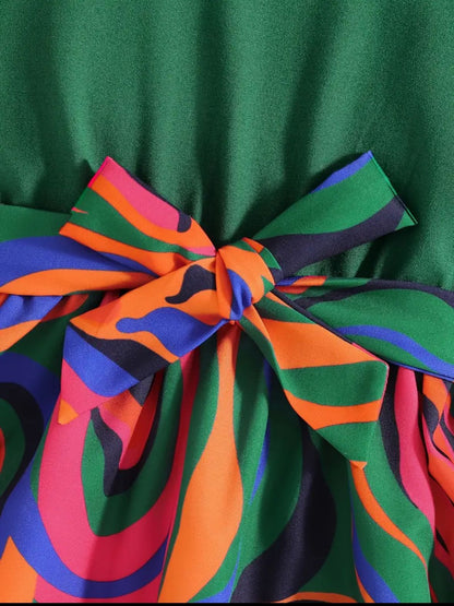 Multicolor belted frock dress with green base and multicolor waist bow