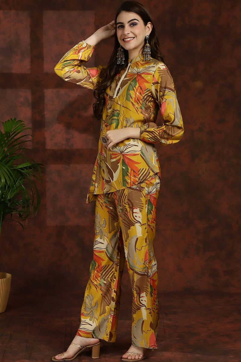 Yellow printed tunic and palazzo set with long sleeves and floral leaf motif