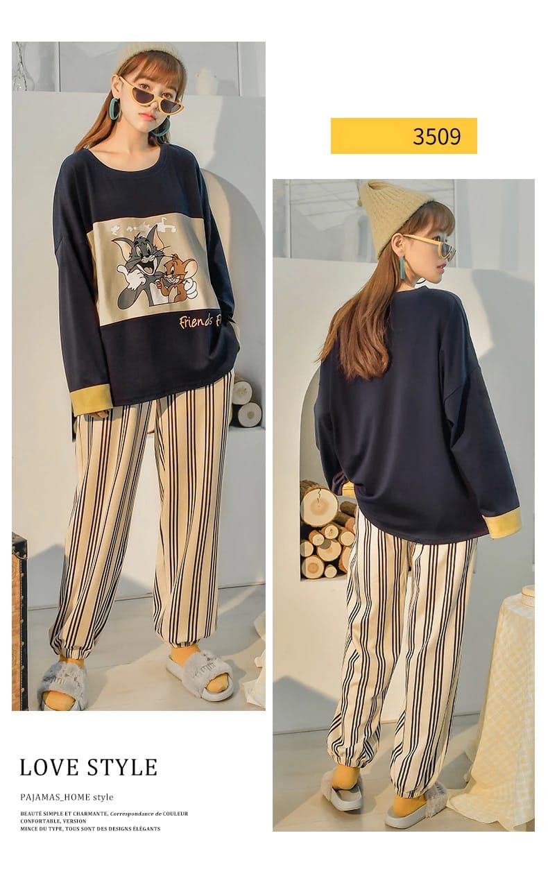 Tom & Jerry navy long-sleeve pajama top with cartoon graphic and striped pajama pants