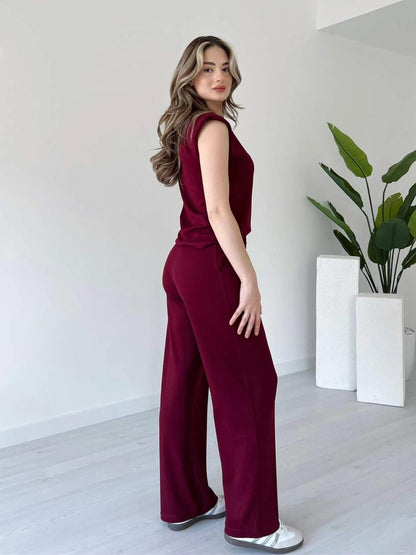 Maroon sleeveless co-ord set with V-neck top and wide-leg trousers