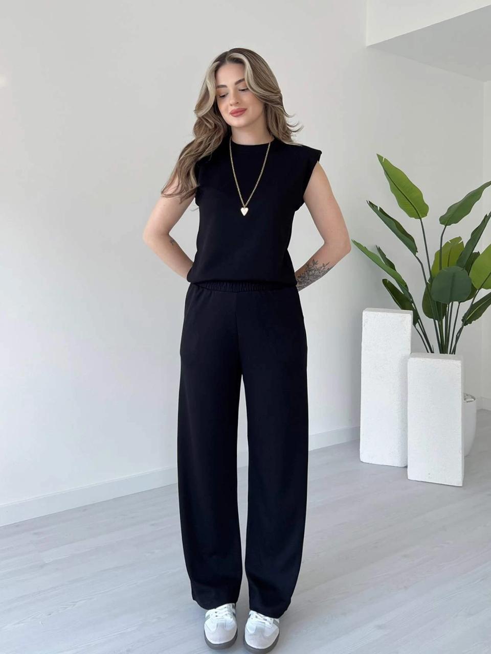 Solid black sleeveless co-ord set with crew neck top and wide-leg trousers