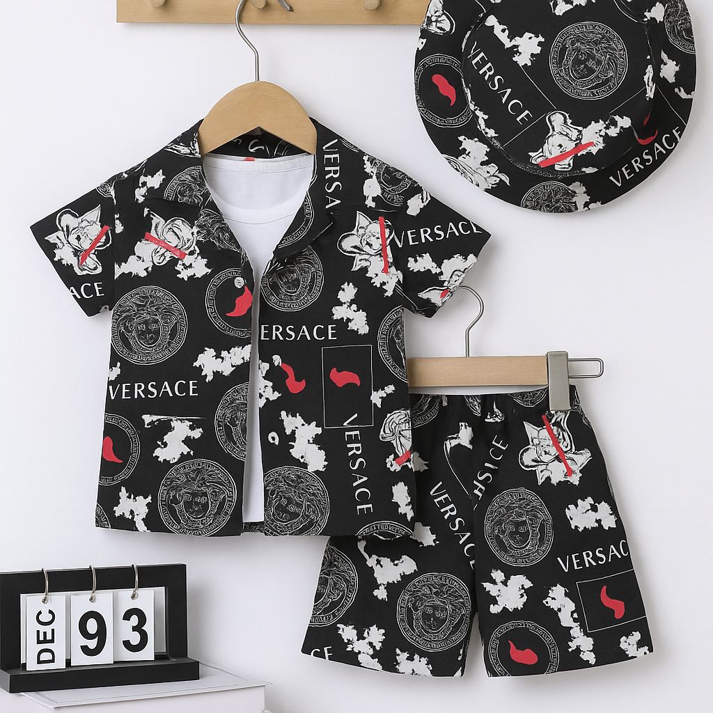Kids black printed shorts set with VERSACE logo polo shirt and matching shorts on hangers