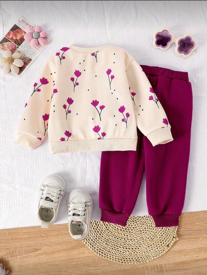 Cream floral sweatshirt and burgundy trousers with cuffs and heart details